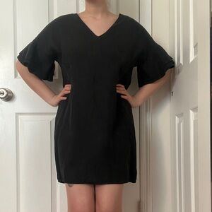 Black dress with flouncy short sleeve shirt